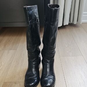 Sleek Black Leather Heeled Boots